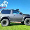PARE CHOC ARRIERE TOYOTA KD - KZ 90 AVEC EXTENSION D'AILES